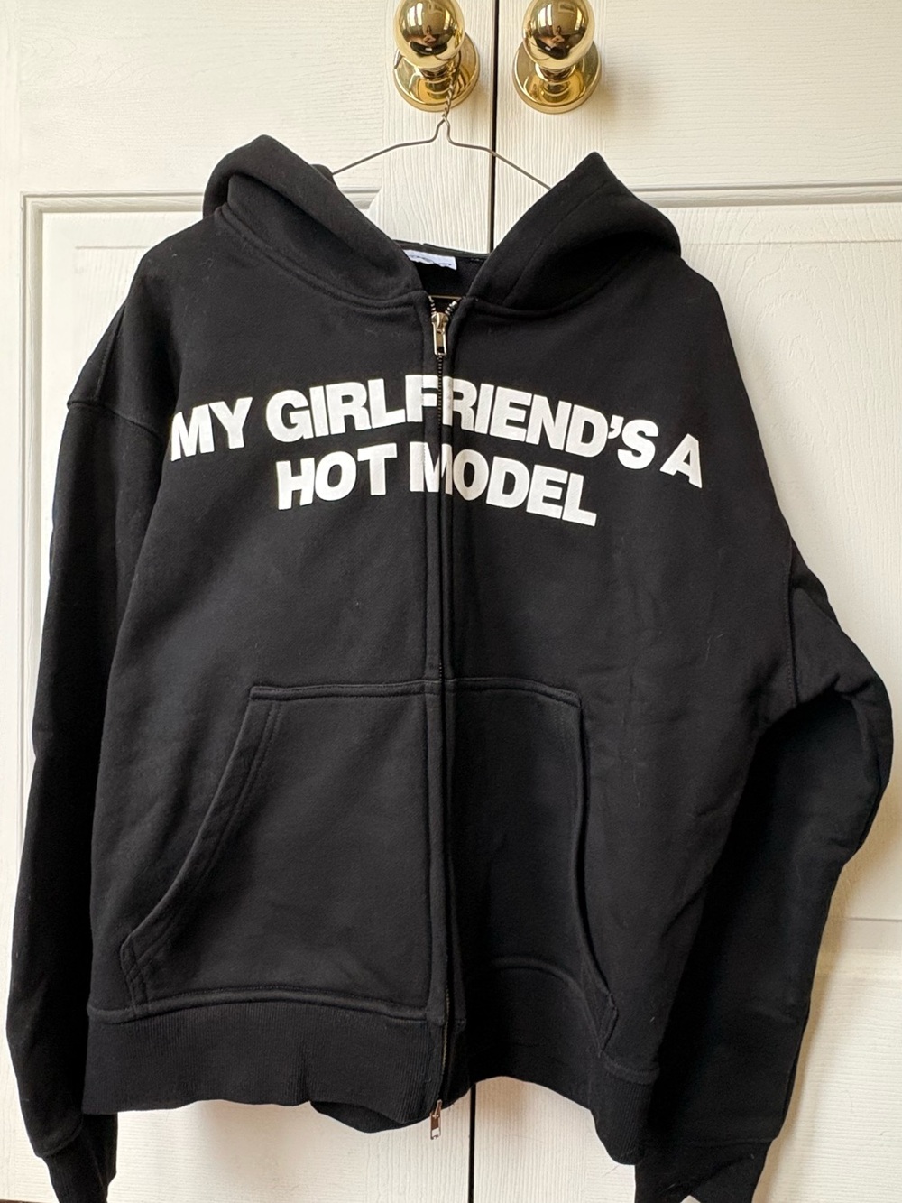 Black Zip-Up Hoodie with Bold White Graphic